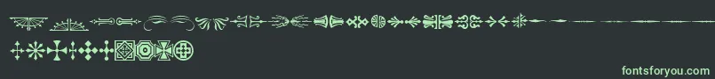 フォントAdobeWoodTypeOrnamentsOne – 黒い背景に緑の文字