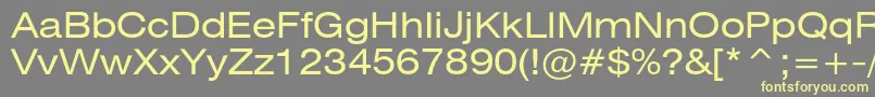 Heliosext Font – Yellow Fonts on Gray Background