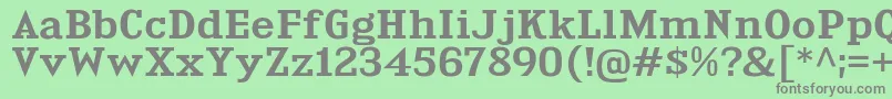 KingsbridgeExSb-fontti – harmaat kirjasimet vihreällä taustalla