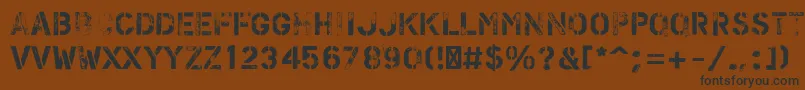 PfstampsproFlex Font – Black Fonts on Brown Background