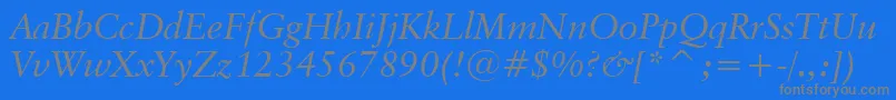ClassicalGaramondItalicBt-fontti – harmaat kirjasimet sinisellä taustalla