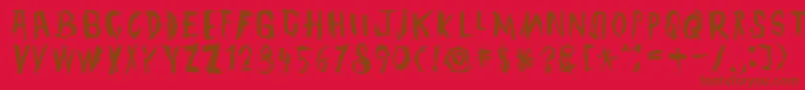 TmbgJohnHenry-Schriftart – Braune Schriften auf rotem Hintergrund