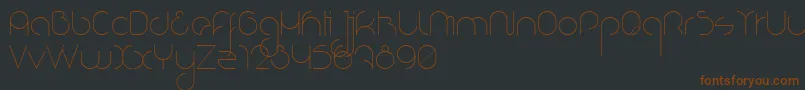 NioubesLight-fontti – ruskeat fontit mustalla taustalla
