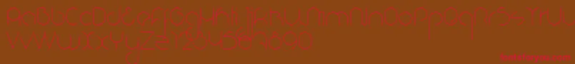 NioubesLight Font – Red Fonts on Brown Background
