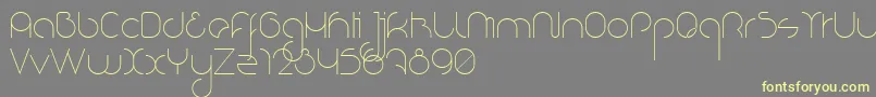 NioubesLight Font – Yellow Fonts on Gray Background