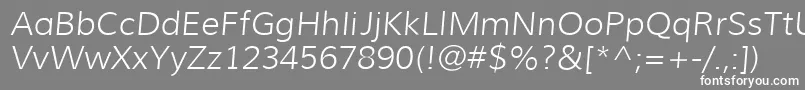 MuliLightitalic-fontti – valkoiset fontit harmaalla taustalla