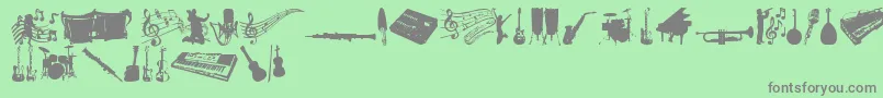 MusicTfb-Schriftart – Graue Schriften auf grünem Hintergrund
