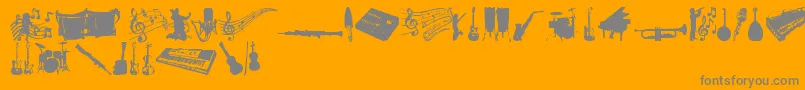 フォントMusicTfb – オレンジの背景に灰色の文字
