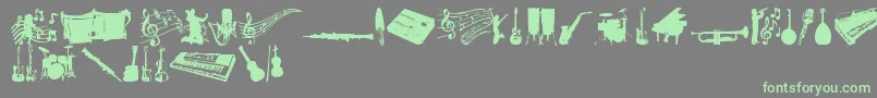 フォントMusicTfb – 灰色の背景に緑のフォント