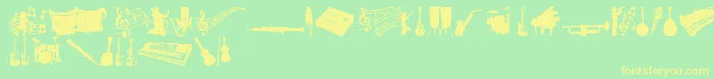 MusicTfb-Schriftart – Gelbe Schriften auf grünem Hintergrund