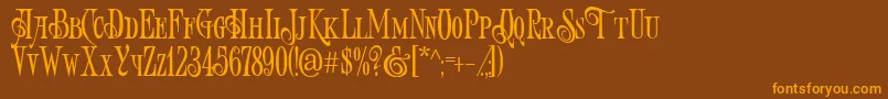 Шрифт ArtVictorian – оранжевые шрифты на коричневом фоне