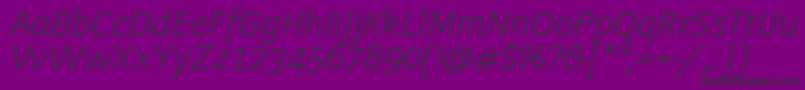 Czcionka JuvenislightItalic – czarne czcionki na fioletowym tle