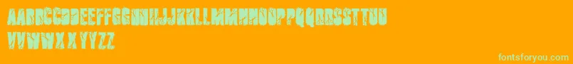 Cutter Font – Green Fonts on Orange Background