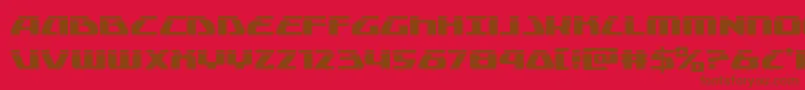 フォントGlobaldynamicslaser – 赤い背景に茶色の文字