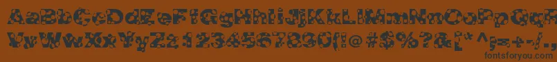 More about HolymolyNormal Font HolymolyNormal Font – Black Fonts on Brown Background