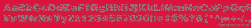 フォントHolymolyNormal – 赤い背景に灰色の文字