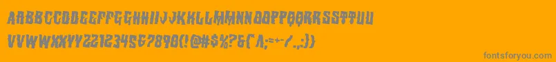 Warlocksalerotate2-Schriftart – Graue Schriften auf orangefarbenem Hintergrund