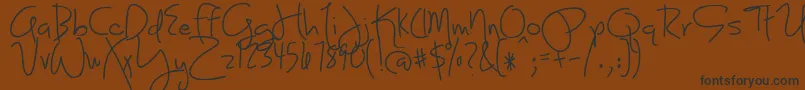 フォントBmdJoyLikeSunshineThroughMyWindowpane – 黒い文字が茶色の背景にあります