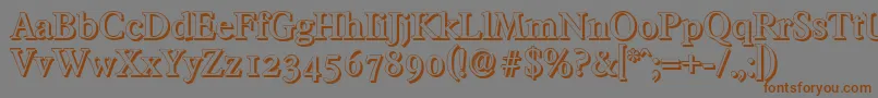 フォントFranciscoshadowMediumRegular – 茶色の文字が灰色の背景にあります。