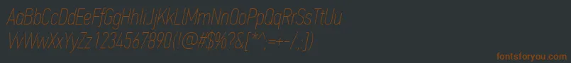 Fonte PfdintextcompproXthinitalic – fontes marrons em um fundo preto