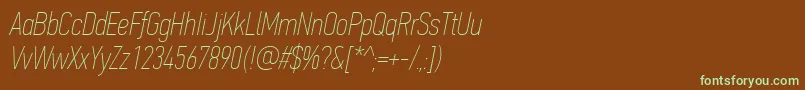 フォントPfdintextcompproXthinitalic – 緑色の文字が茶色の背景にあります。