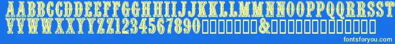Quentincaps Font – Yellow Fonts on Blue Background
