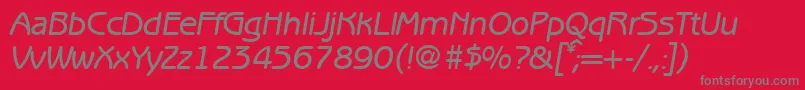 BenjaminsansmediumRegularitalic-fontti – harmaat kirjasimet punaisella taustalla