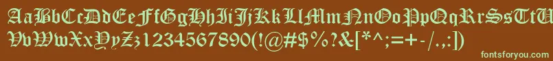 フォントOtterdbNormal – 緑色の文字が茶色の背景にあります。