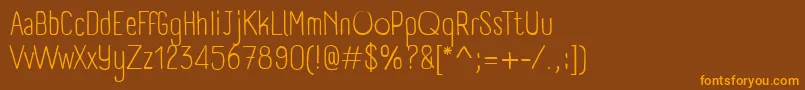 PanforteLight-Schriftart – Orangefarbene Schriften auf braunem Hintergrund