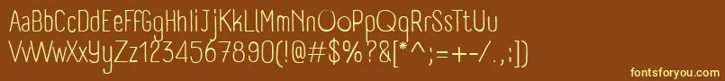 PanforteLight-fontti – keltaiset fontit ruskealla taustalla