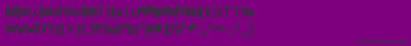 Emileecaps Font – Black Fonts on Purple Background
