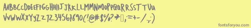 フォントEmileecaps – 黄色の背景に灰色の文字