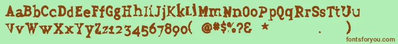 Grudge Font – Brown Fonts on Green Background