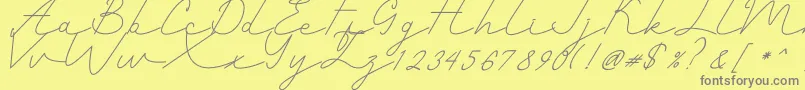 Weitere Informationen zur Romantic-Schriftart Romantic-Schriftart – Graue Schriften auf gelbem Hintergrund