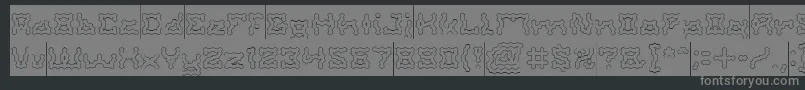 フォントShakeItOffHollowInverse – 黒い背景に灰色の文字