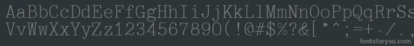 Optimusctt-fontti – harmaat kirjasimet mustalla taustalla