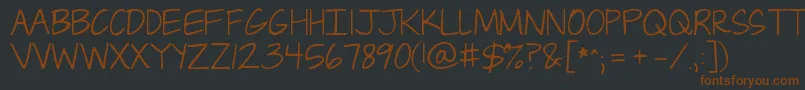 Jandacapslock Font – Brown Fonts on Black Background