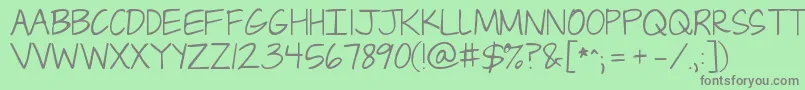 Jandacapslock Font – Gray Fonts on Green Background