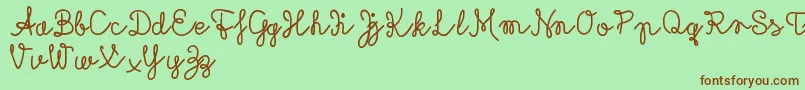 Rubicandemo Font – Brown Fonts on Green Background