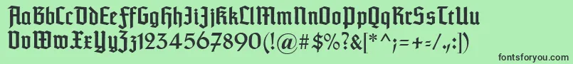 Typographertexturunz1-fontti – mustat fontit vihreällä taustalla