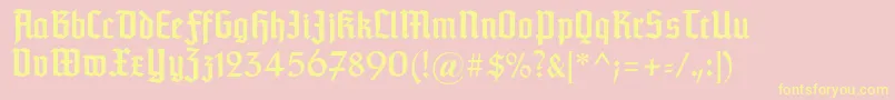 Typographertexturunz1-fontti – keltaiset fontit vaaleanpunaisella taustalla