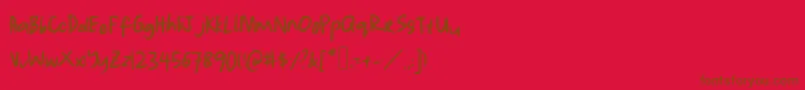 フォントLauwrites – 赤い背景に茶色の文字