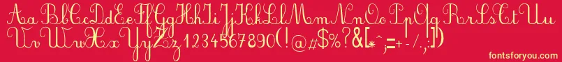 Czcionka PlumScript – żółte czcionki na czerwonym tle