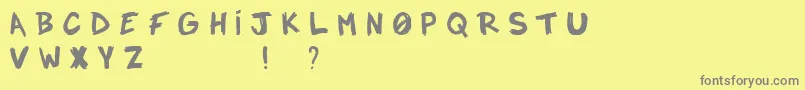 フォントNotadrope – 黄色の背景に灰色の文字