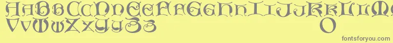 フォントMissaluncialemaster – 黄色の背景に灰色の文字