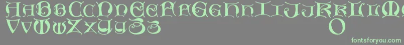 フォントMissaluncialemaster – 灰色の背景に緑のフォント
