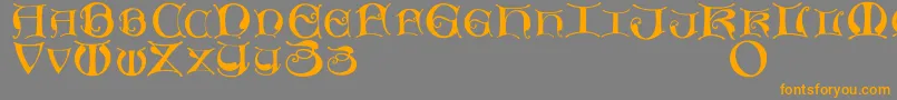 フォントMissaluncialemaster – オレンジの文字は灰色の背景にあります。