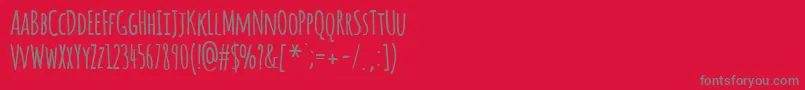 フォントAmaticBold – 赤い背景に灰色の文字