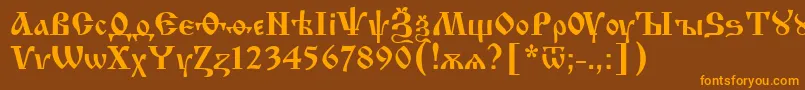 フォントIzhitsa0 – オレンジ色の文字が茶色の背景にあります。