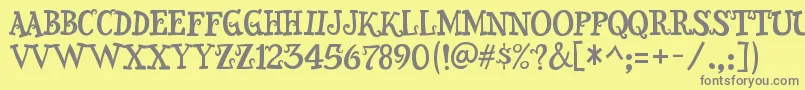 Snidely-Schriftart – Graue Schriften auf gelbem Hintergrund